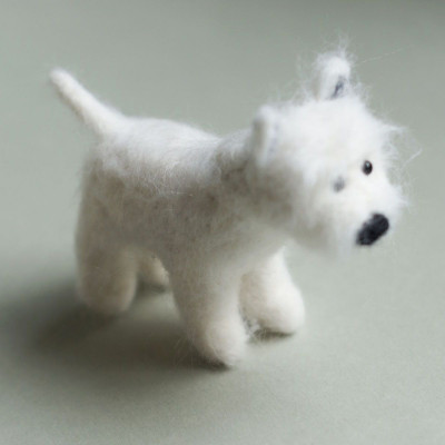 Weißer Merinokammzug